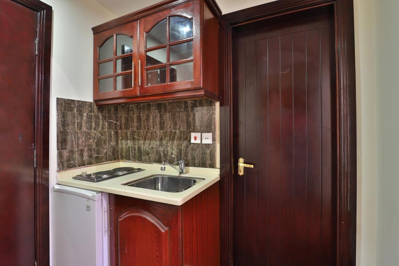 Oyo 335 Manazil Al Ain Grand Hotel Мека Екстериор снимка