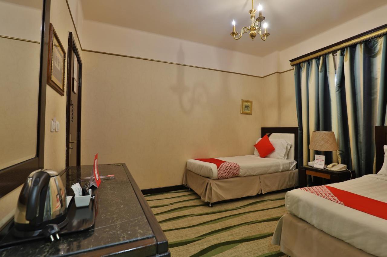Oyo 335 Manazil Al Ain Grand Hotel Мека Екстериор снимка
